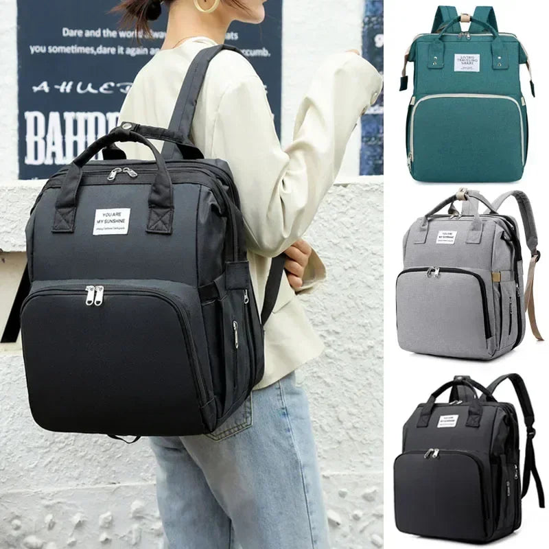 Sac à Langer Tendance 4-en-1 avec Lit/Couchette Pliable Intégré – Grande Capacité (36-55L) – Idéal Voyage & Sorties